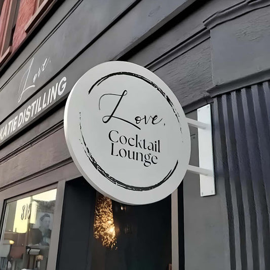 Double sided round blade sign A modern Blade Sign for enhanced visibility! Its double-sided design makes it a durable and stylish signage solution for pedestrian traffic.