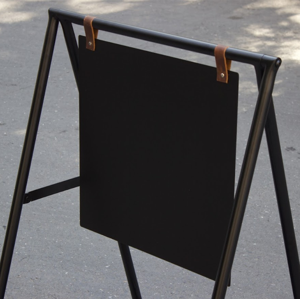 Blank or printed A-frame sidewalk sign with a tray, perfect for shops and cafes. The tray provides additional space for promotional materials, while the sign is ideal for indoor and outdoor use. Recognized by the keywords ‘small business sign’ and ‘cafe sign.’