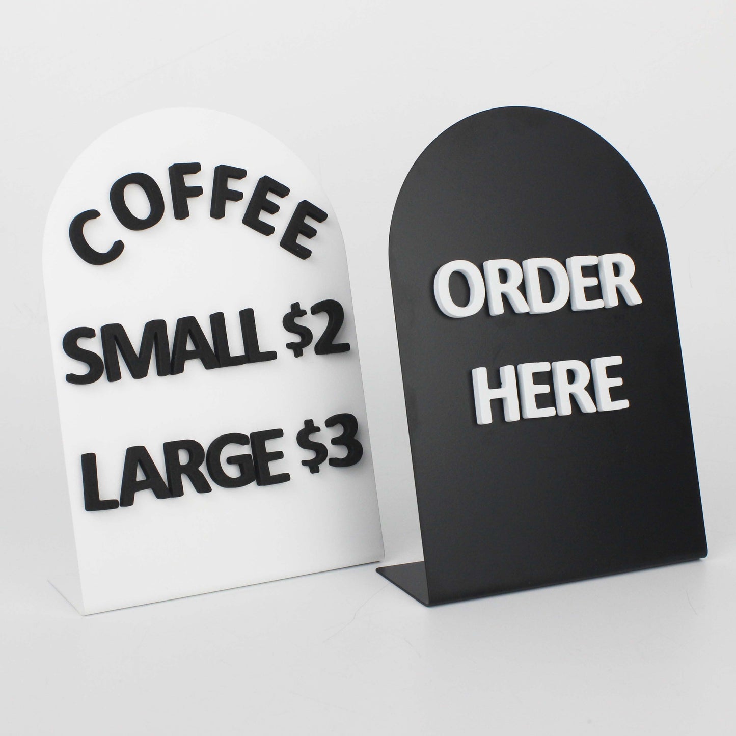 Black and white durable metal tabletop panels with foam magnetic letters, customizable for displaying menus, prices, or messages. Perfect for cafés, restaurants, and other businesses seeking a stylish and functional communication solution.