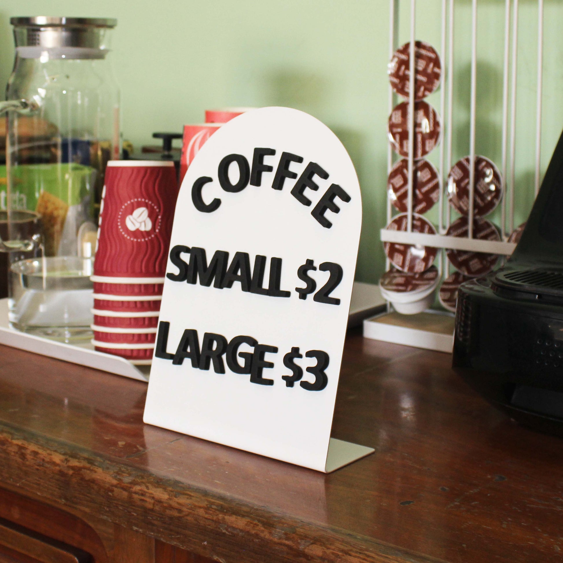 Elegant black and white metal tabletop signs with foam magnetic letters, ideal for showcasing daily specials, pricing, or custom messages. A versatile choice for cafés and restaurants.
Durable metal countertop panels featuring foam magnetic letters, designed for effortless message updates. Perfect for adding a modern touch to your café or business.
Stylish foam magnetic letter displays on sleek metal panels, perfect for menus, announcements, or promotions. A practical and portable solution for restaurants