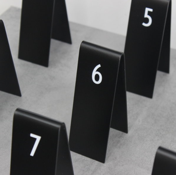 "Customizable Custom Table Number Stackers for small businesses and cafes. Durable and stylish with options for logo printing and QR code integration."