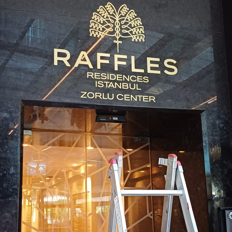 Entrance to Raffles Residences Istanbul with a ladder in front