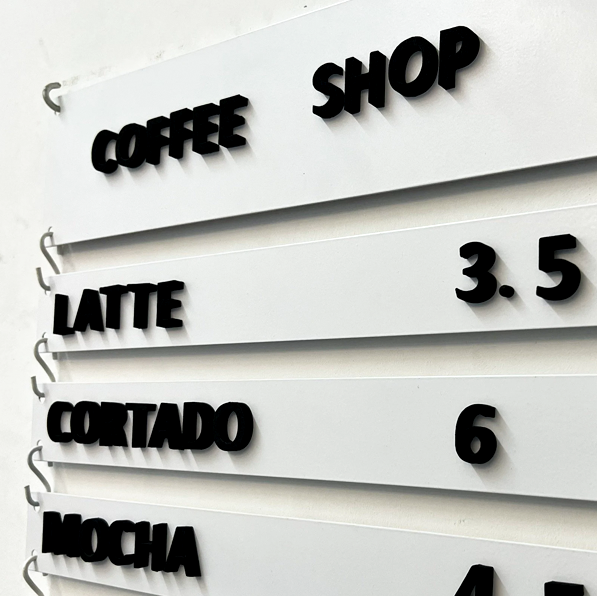 Perfect for restaurants and cafes, this wall-mounted magnetic menu can be blank or printed, providing a stylish way to display your food and beverage options.