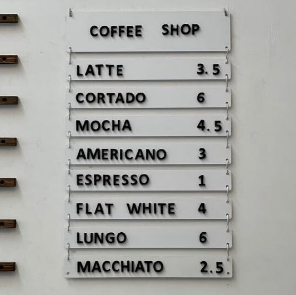 Designed for use in restaurants, offices, and salons, this customizable wall menu allows you to easily update your listings. Choose between blank or printed versions to fit your needs.