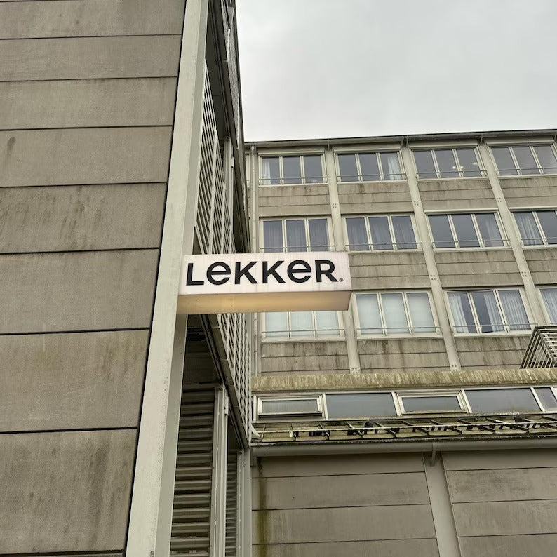LEKKER sign on a building facade