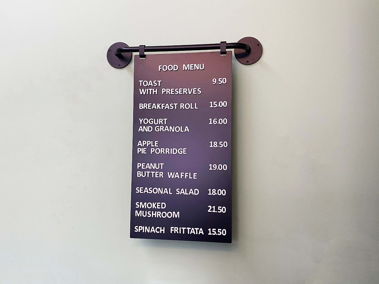 A magnetic price display board designed to easily update prices and offers in cafes, restaurants, and retail stores. The board features magnetic letters that stay in place but can be quickly rearranged to reflect menu changes or promotions. This restaurant menu board with letters ensures a polished, organized look and is perfect for high-traffic areas.

