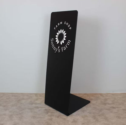 Black stand with Sonny's Farm logo on a gray background