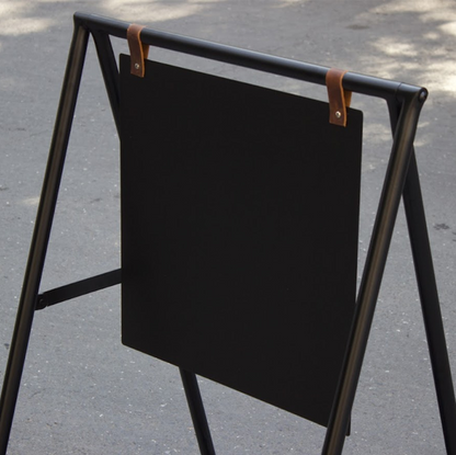 Blank or printed A-frame sidewalk sign with a tray, perfect for shops and cafes. The tray provides additional space for promotional materials, while the sign is ideal for indoor and outdoor use. Recognized by the keywords ‘small business sign’ and ‘cafe sign.’






