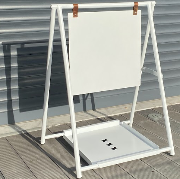 Portable double-sided A-frame sidewalk sign with a tray, ideal for outdoor advertising at your business entrance. The tray beneath offers space for additional materials, and the sign can be used printed or blank for daily announcements. Known as a ‘sidewalk sandwich sign’ and ‘storefront A-frame sign.’

