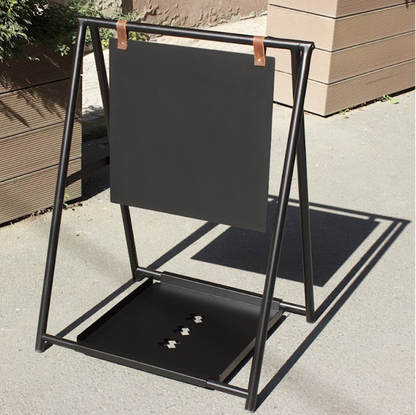 Double-sided A-frame sidewalk sign with a tray, ideal for displaying daily menus, promotions, or announcements. The tray allows for easy storage of flyers or other promotional items, recognized by the keywords ‘sidewalk sandwich sign’ and ‘storefront A-frame sign.’

