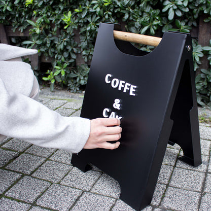 Portable sidewalk sign with changeable magnetic letters