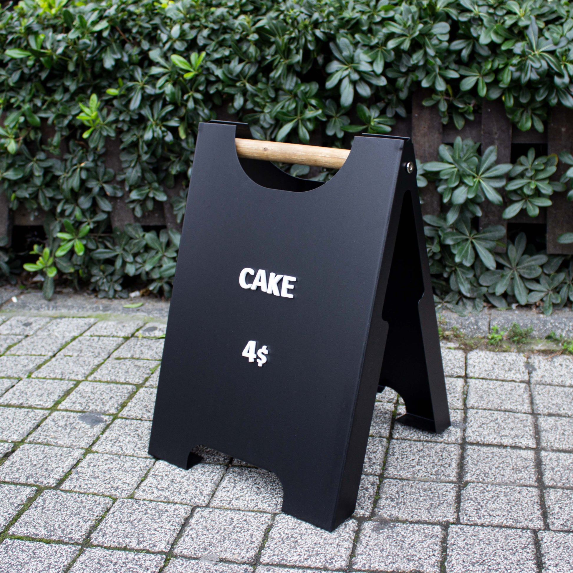 Custom UV printed signage on outdoor pavement sign