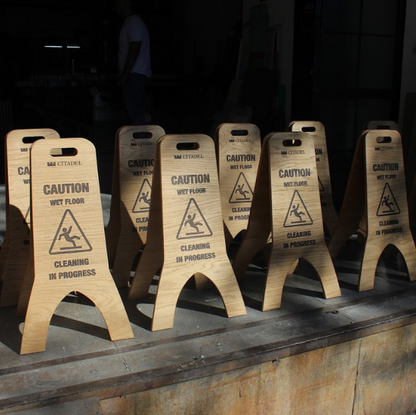 Ideal for any business like schools, offices, and salons, this blank or printed wooden sign helps prevent accidents with its clear wet floor warning on both sides.
