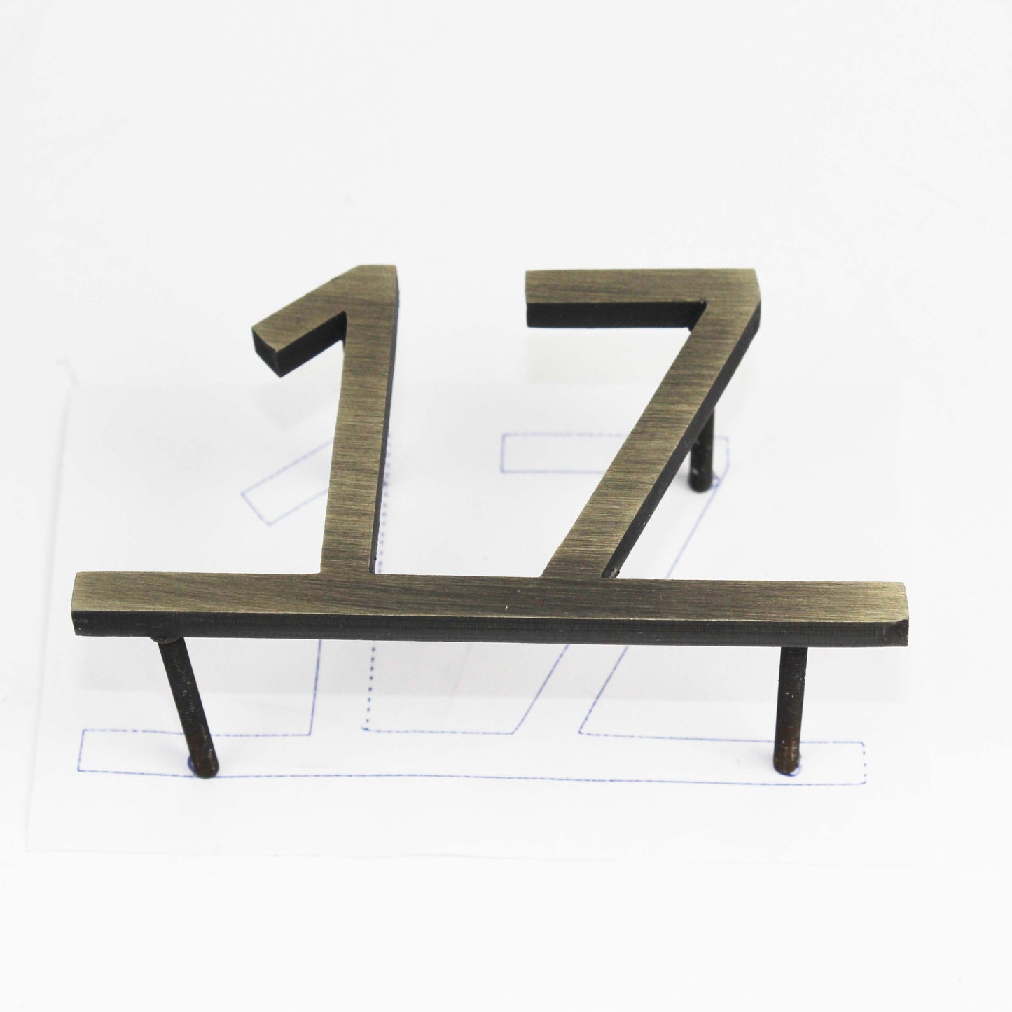 This modern door number sign features clean lines and a simple yet striking metallic finish. Its minimalist design seamlessly integrates into different architectural styles, from contemporary offices to high-end apartments. The reflective surface catches light beautifully, enhancing visibility while maintaining an understated elegance. A must-have for those who appreciate modern aesthetics and practicality.

