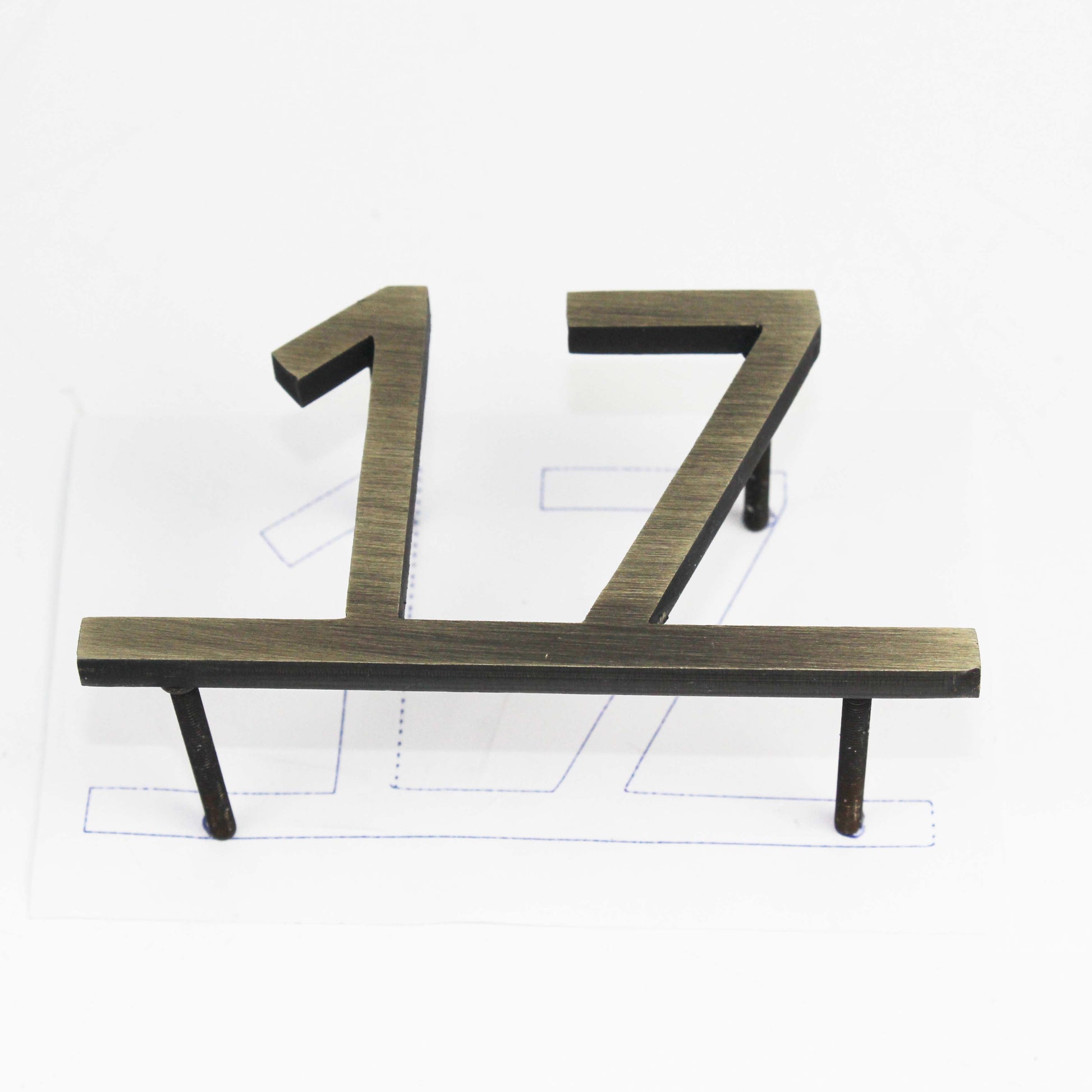 This modern door number sign features clean lines and a simple yet striking metallic finish. Its minimalist design seamlessly integrates into different architectural styles, from contemporary offices to high-end apartments. The reflective surface catches light beautifully, enhancing visibility while maintaining an understated elegance. A must-have for those who appreciate modern aesthetics and practicality.

