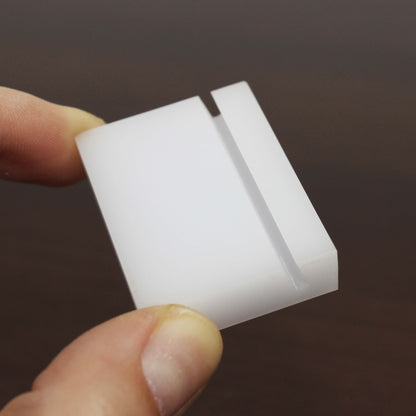 With its compact and elegant design, the minimalist card holder is a versatile solution for organizing name tags or price signs in any retail or office setting.

