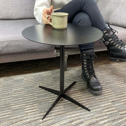 The modern round metal table adds an elegant touch to any space with its simple and sleek design. Its durable metal structure ensures long-lasting use. Its compact size fits easily into small areas, offering functional use. Ideal for cafes, restaurants, hotels, and homes.

