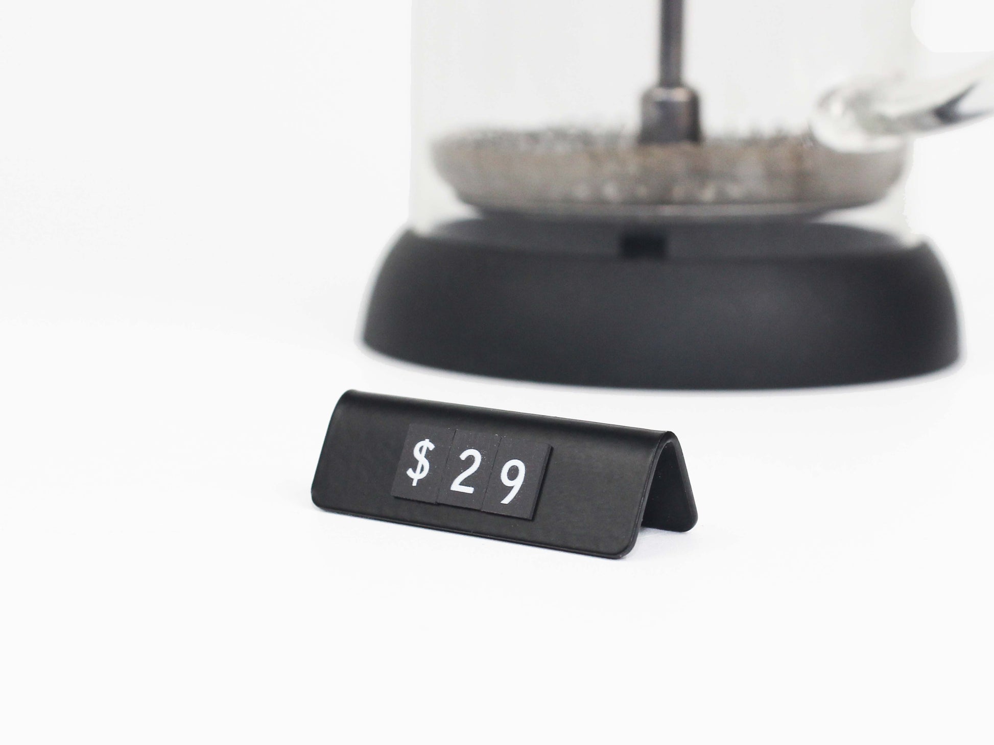 "Upgrade your business displays with a comprehensive set including durable holders and 500 magnetic symbols for versatile use."

