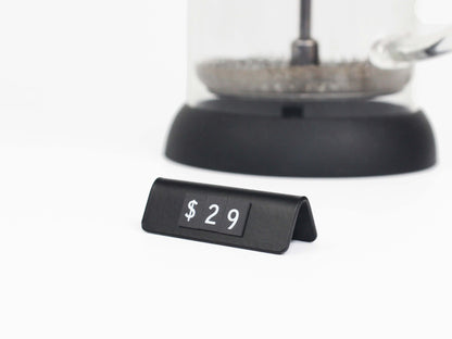 "Upgrade your business displays with a comprehensive set including durable holders and 500 magnetic symbols for versatile use."

