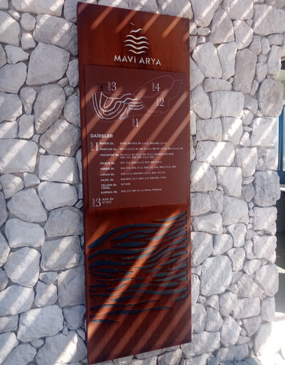 Mavi Arya product packaging against a stone wall