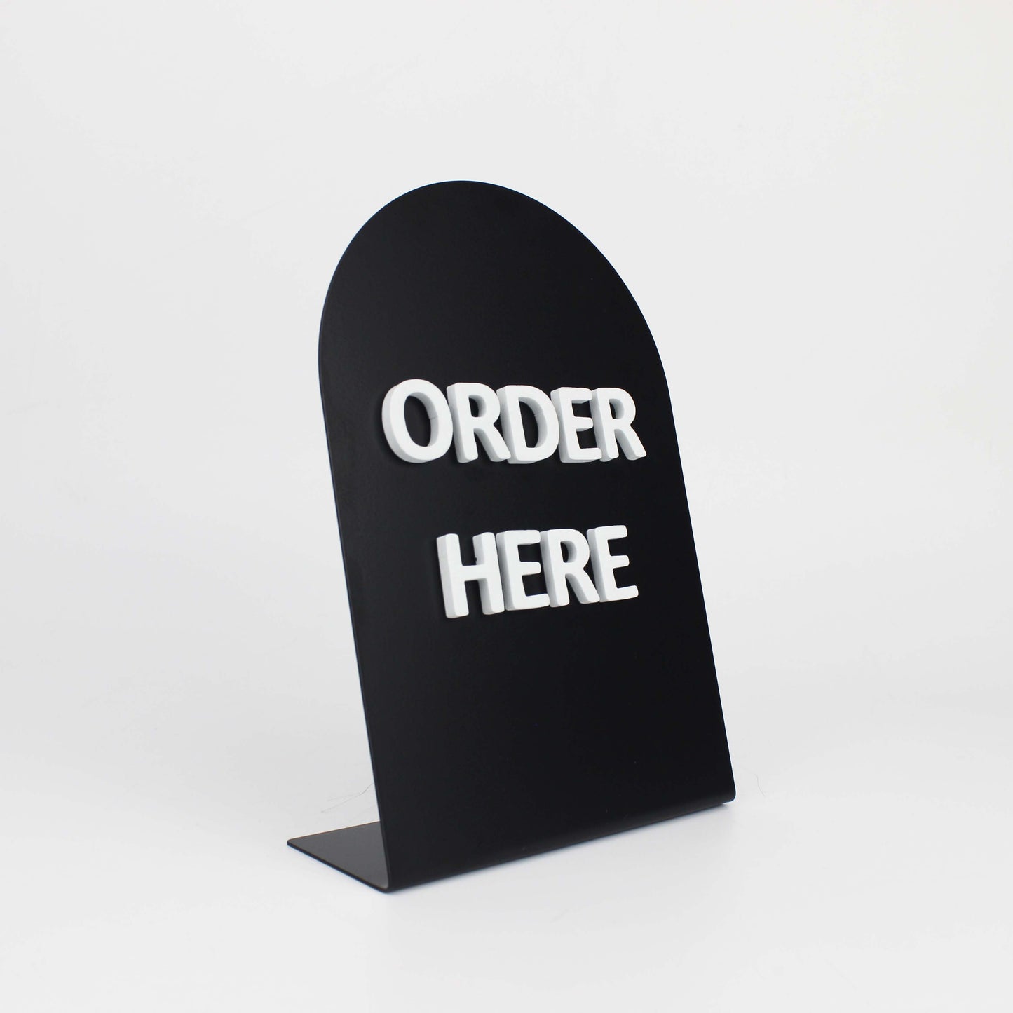 Stylish foam magnetic letter displays on sleek metal panels, perfect for menus, announcements, or promotions. A practical and portable solution for restaurants and shops.