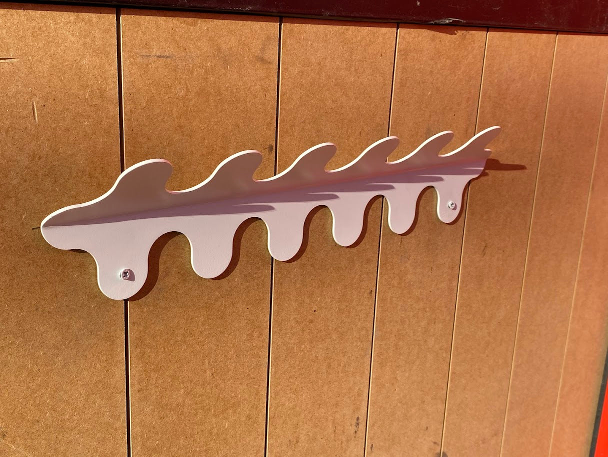 Designed to complement both modern and classic décor, the custom hanger’s wavy structure brings charm and organization to any space. Made from strong metal, this hanger adapts easily to different environments. It’s perfect for hanging clothes, bags, or accessories, offering both style and utility. Its clean, elegant finish elevates the look of your room, making it a must-have for anyone who values both functionality and design.

