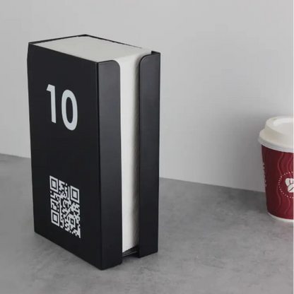 Our napkin dispensers are crafted from durable materials and designed for easy use. The inclusion of customizable table numbers and QR codes enhances both quality and convenience in your dining experience.