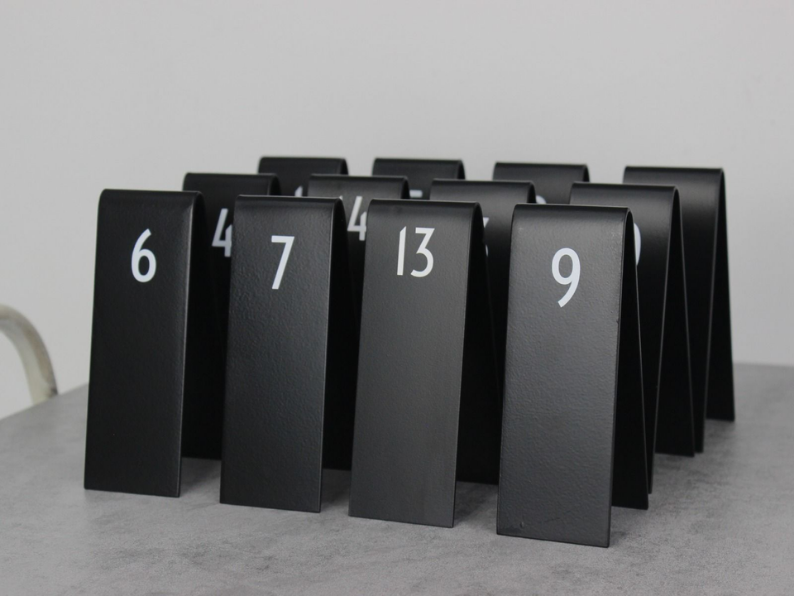 "Custom double-sided table numbers with logo printing, ideal for cafes and restaurants. They can also be used as reserved signs with multiple customization options."

