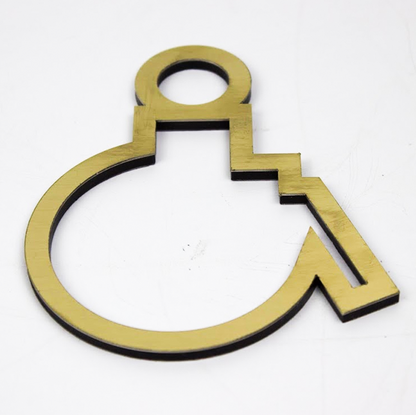 Gold wheelchair accessibility symbol on a white background