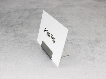 This stainless steel card holder provides a sleek way to label products in cafés and bakeries. Because it resists corrosion and has a polished finish, it ensures long-lasting elegance. Its compact 4x3x1 cm size is perfect for food counters or bakery shelves.

Showcase price tags or product names clearly and stylishly. Ideal for labeling pastries, baked goods, or retail products, and because of its sturdy material, it’s suitable for any professional environment.

