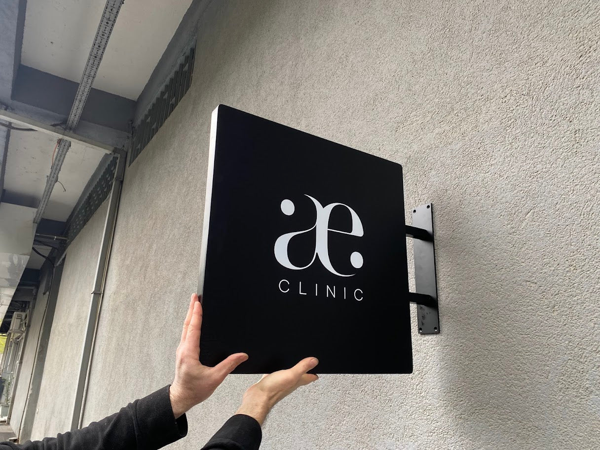 Sleek and modern aluminum double-sided square blade sign with thick edges, easy to install, and designed for long-lasting performance, perfect for both retail and outdoor promotional use.
