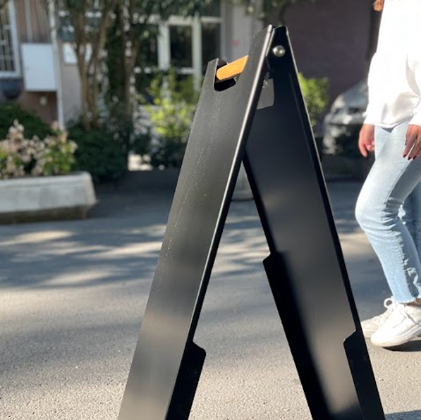 Event Announcement Sign: The sidewalk sandwich sign can serve as an event announcement sign, effectively conveying important information about upcoming activities or promotions. Its customizable surface allows for clear, engaging messaging.


