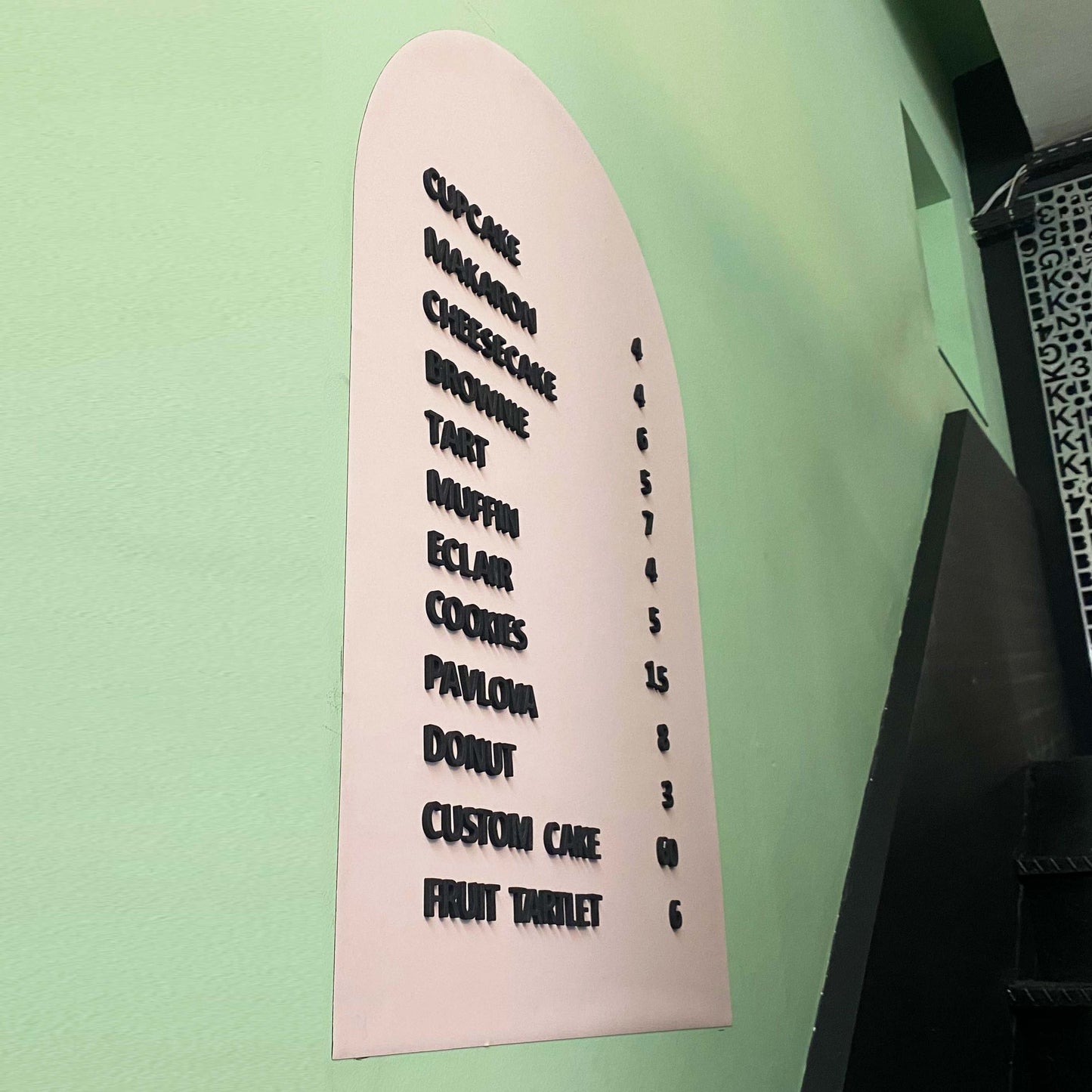 A flexible and easy-to-update magnetic price display board, ideal for bakeries, coffee shops, and retail stores. The bendable metal sticker base adheres to flat and curved surfaces, ensuring versatility in various display settings. Included magnetic letters and numbers allow business owners to update pricing, promotions, and product names effortlessly. This menu board is particularly useful for businesses looking for a stylish, reusable, and cost-effective signage solution that enhances visual appeal while 