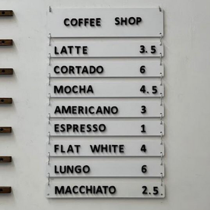 Designed for use in restaurants, offices, and salons, this customizable wall menu allows you to easily update your listings. Choose between blank or printed versions to fit your needs.