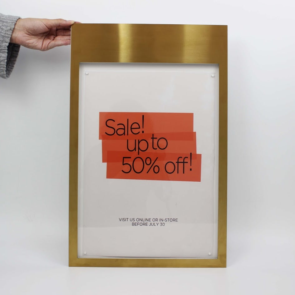 This wall-mounted magnetic menu box features a sleek brass frame, combining durability and elegance for a professional menu display.

any message display sign