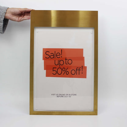 This wall-mounted magnetic menu box features a sleek brass frame, combining durability and elegance for a professional menu display.

any message display sign
