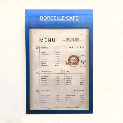 This image highlights the magnetic menu box placed against a clean, light-colored wall, making the brass frame and the A3-sized menu stand out beautifully. The durable yet lightweight construction ensures it’s easy to install and adjust as needed. Ideal for cafes, offices, or promotional campaigns, the visual underscores the product’s functionality and ability to adapt to various uses while maintaining a polished and professional look.






