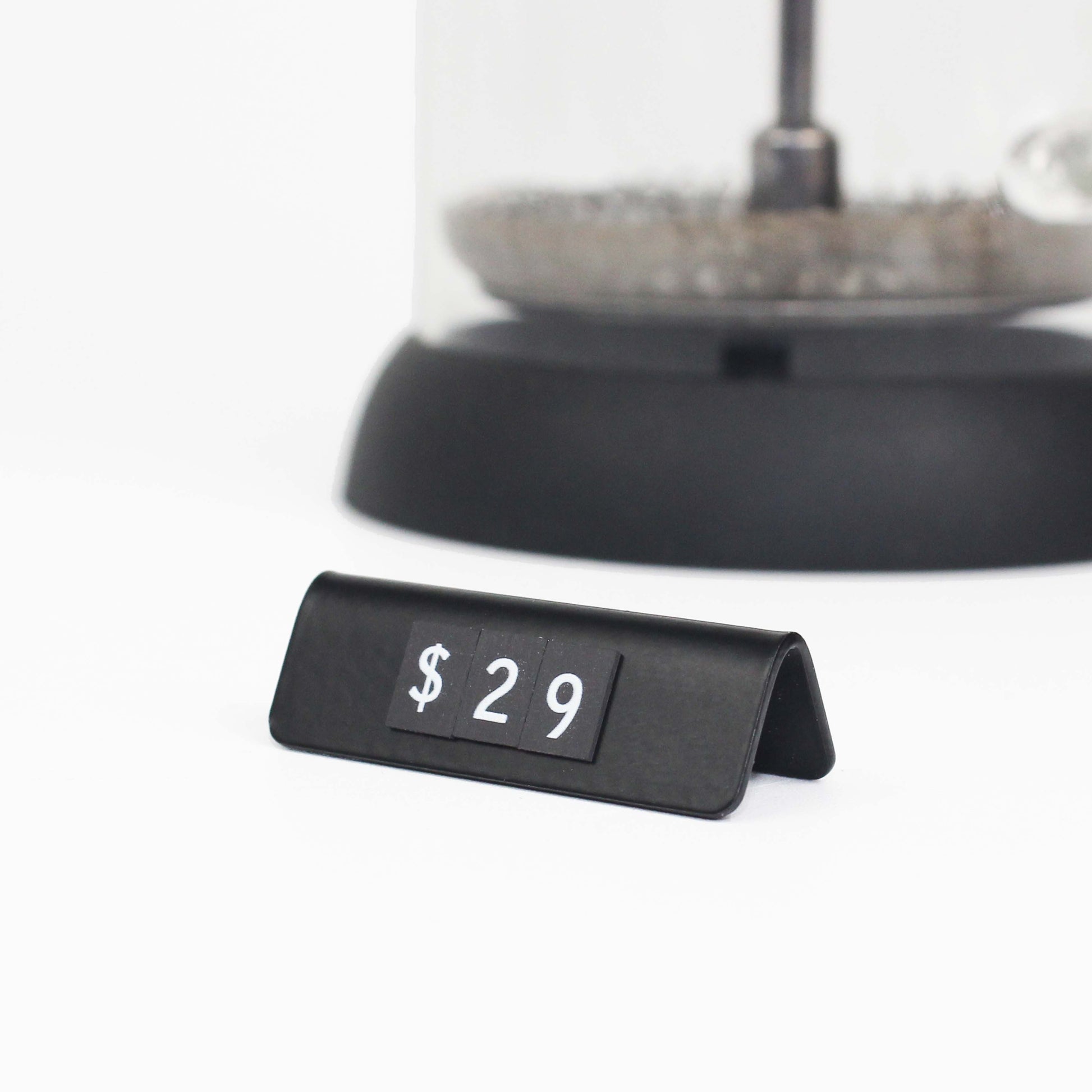 "Upgrade your business displays with a comprehensive set including durable holders and 500 magnetic symbols for versatile use."

