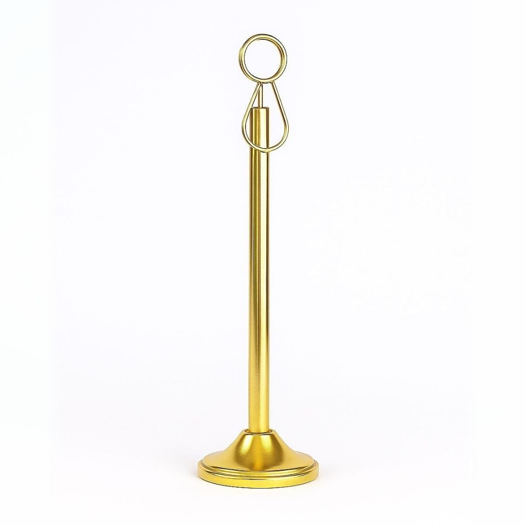 Gold metal stand with circular top on a white background