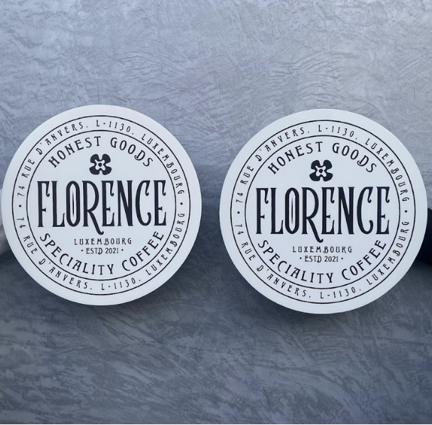 Wall Mounted Round Sign: This stylish wall-mounted round sign gives your space a professional look and effectively promotes your brand.