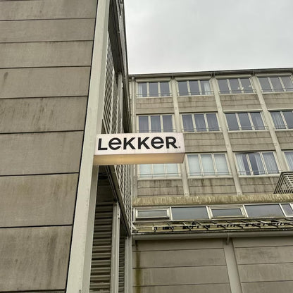 LEKKER sign on a building facade