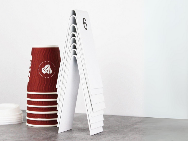"Double-sided table numbers, perfect for table reservations. Customizable with metal and wood options, designed for small businesses and coffee shops."

