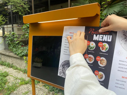 The Rechargeable Led Menu Board is a fantastic addition to any business that wants to elevate its menu presentation. Perfect for restaurants, cafes, and bars, this board allows you to display your menu items, daily specials, or promotional content in an eye-catching way. Its wireless charging system ensures it is always ready for use, and because of its lightweight design, you can easily move it between different areas within your establishment. This flexibility makes it ideal for both indoor and outdoor us