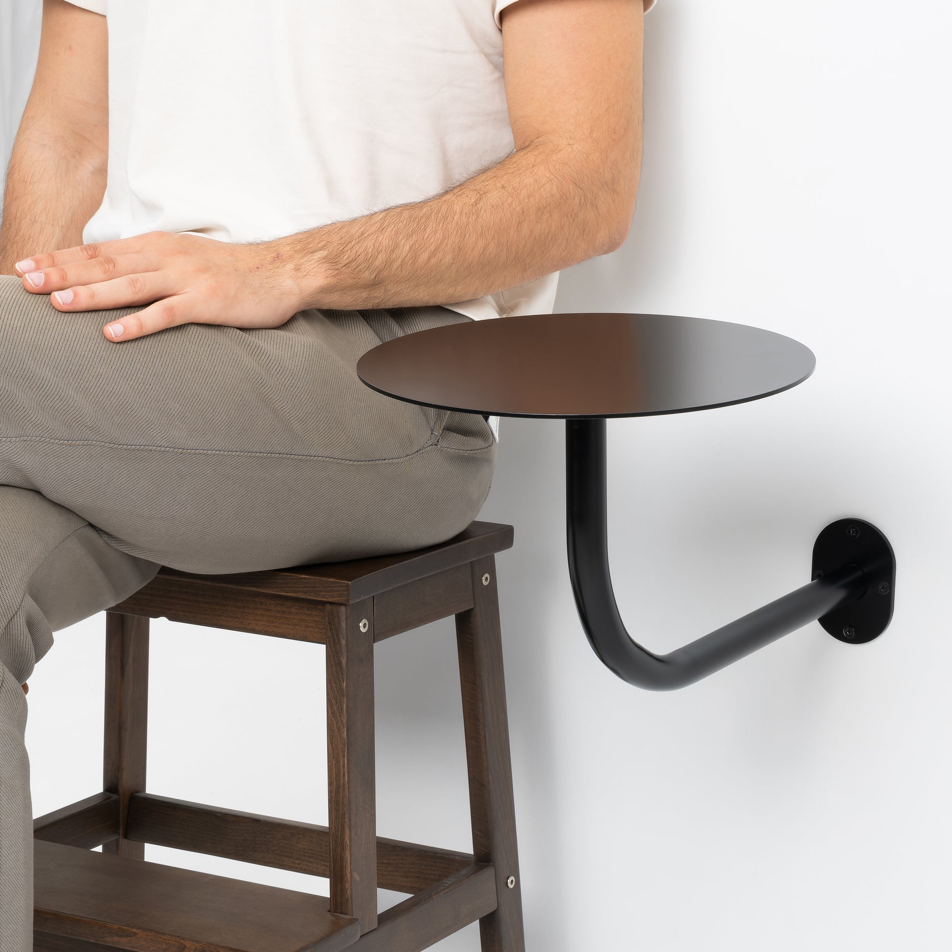 Durable wall mounted table available in multiple color options.