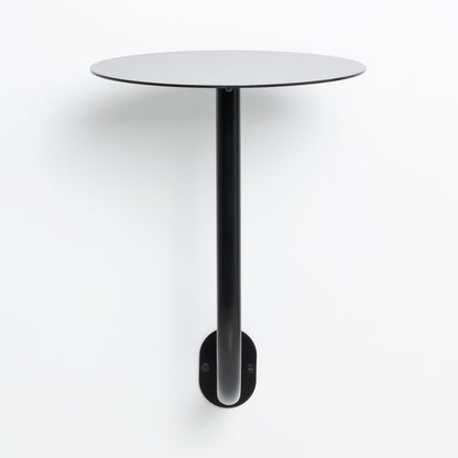 Sleek and functional wall mounted table for indoor and outdoor use.
