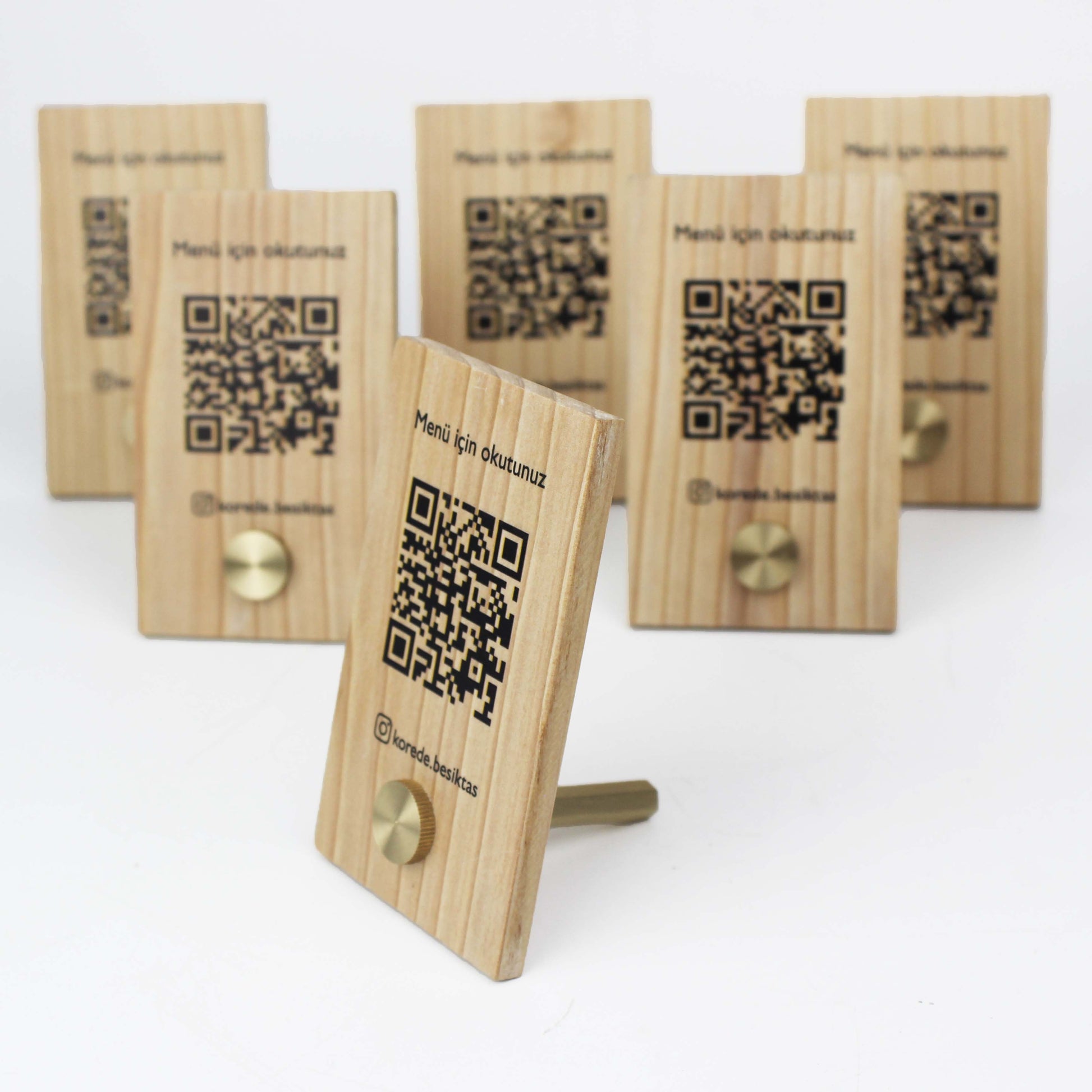 A rustic table number stand adds warmth and charm to any venue. Crafted from natural wood, it features a minimalist yet striking design that fits seamlessly into any decor style. Use it for table numbers, QR codes, or menu displays. Pair it with a wooden menu display table stand to create a coordinated and inviting atmosphere that delights your customers.

