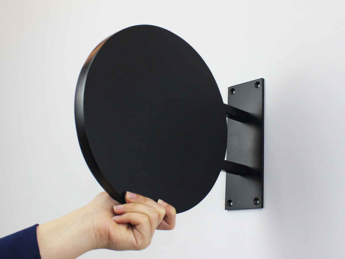 Blank black thick round blade sign with two support arms and wall plate