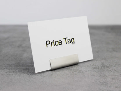 Perfect for showcasing baked goods, ceramics, or specialty items. Because of its polished finish, it complements both casual and refined settings, offering practicality and style in one. Package includes 20 pieces.
This stainless steel price tag card holder combines functionality with a modern aesthetic. Its sleek design elevates any buffet or retail space, and because it’s made of stainless steel, it resists corrosion and ensures lasting quality.
With dimensions of 4x3x1 cm, it fits easily in tight spaces
