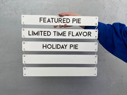 Menu boards in cafés make it easier for visitors to place orders while contributing to the overall atmosphere of the venue. They combine aesthetics and functionality.

