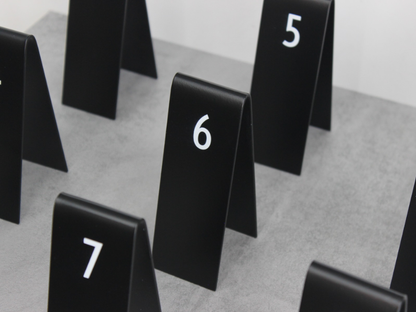 "Customizable Custom Table Number Stackers for small businesses and cafes. Durable and stylish with options for logo printing and QR code integration."


